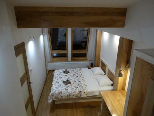 Apartamenty Pod R�?ami