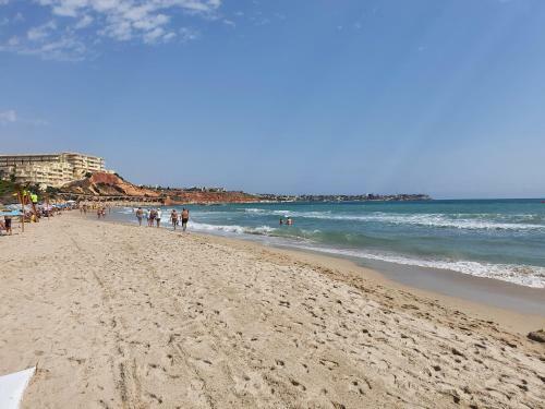 Apartment In Campoamor Overlooking The Swimming Pool
