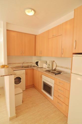 Apartment In Campoamor Overlooking The Swimming Pool