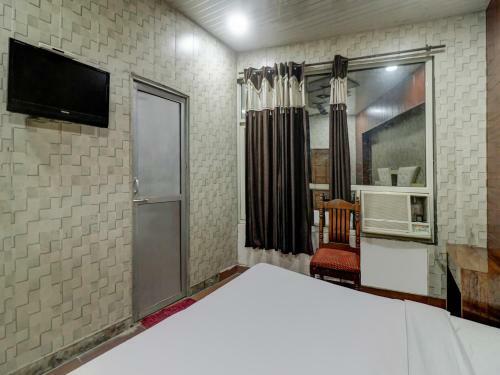 Hotel Capital O 82559 Royal Plaza