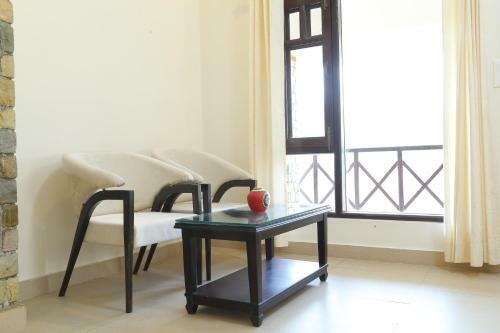 Saffronstays Ghughuti Ku Baasa