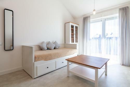 White Sand Apartment With A Balcony, By Cohost