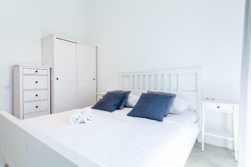 White Sand Apartment With A Balcony, By Cohost