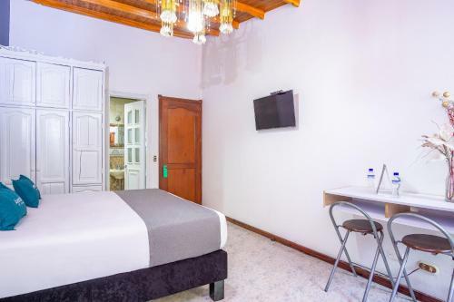 Hostal Ayenda Casa Impacto