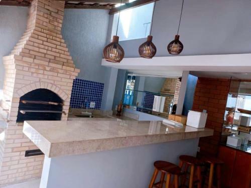 Casa 3 Suites Ar/piscina/churrasqueira