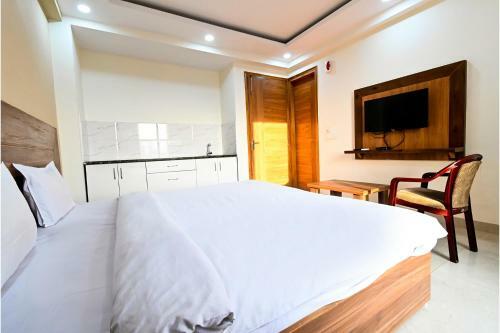 Fabhotel Holy House