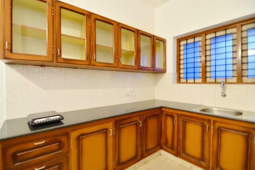 Hostal Oyo 79000 Grace Apartment