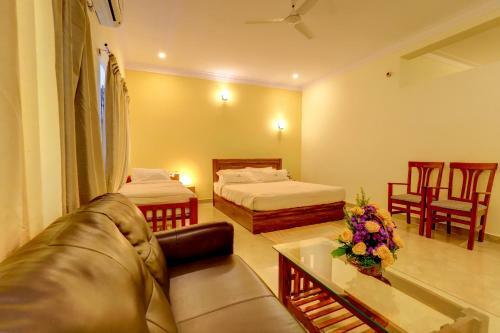 Hotel Ezzenza Royal Garden Brindavan Resort