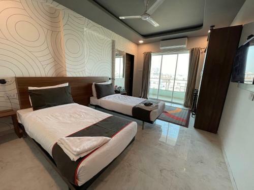 Hotel Manomay Homes