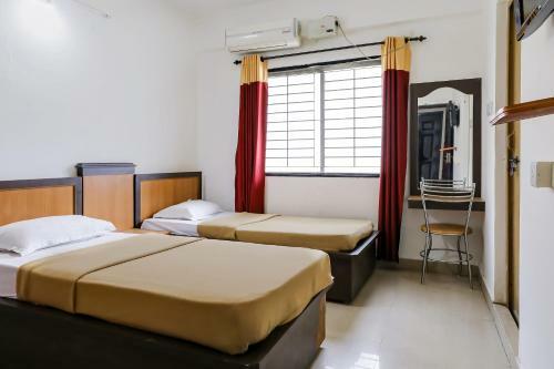 Hotel Spot On 39663 Sangamam Residency