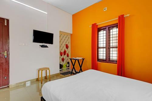 Hotel Capital O 84184 Pop Tavern Kazhakkottam