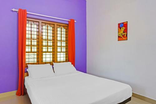 Hotel Capital O 84184 Pop Tavern Kazhakkottam