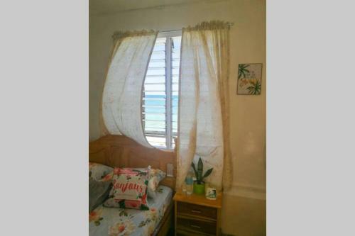Apartamento One Beachfront Room In Daanbantayan With Stand Fan
