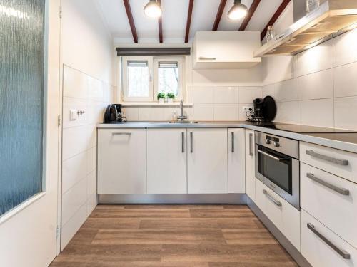 Inviting Bungalow In Epe With Hot Tub
