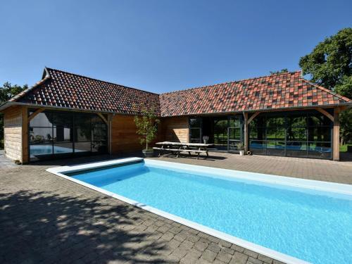 Spacious Holiday Home In Herveld With Pool