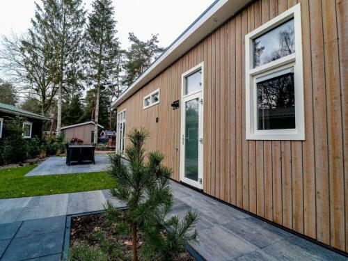 Modern Chalet With A Dishwasher, Located On A Pond