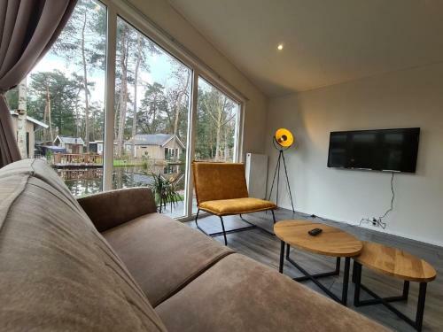 Modern Chalet With A Dishwasher, Located On A Pond