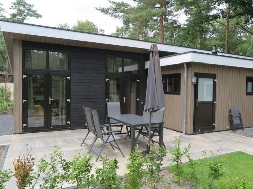 Spacious Chalet With Decorative Fireplace, Located On The Veluwe