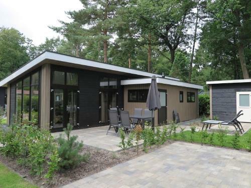 Spacious Chalet With Decorative Fireplace, Located On The Veluwe