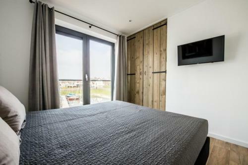 Ferienhaus D'ouwe Haven 10 C