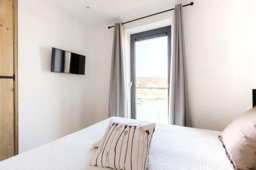 Ferienhaus D'ouwe Haven 10 C