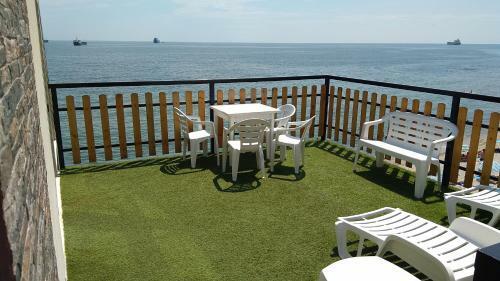 Hostal Happy Beach Rooms