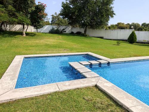 Bed & Breakfast Casa Roja, Puerta Trasera, Jard�n Y Alberca