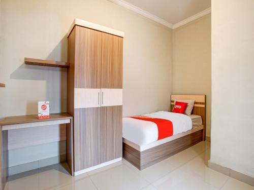 Hotel Vaccinated Staff - Oyo 90174 Ebarly Syariah