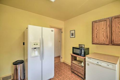 Quaint Creekside Home With Spacious Deck And Yard