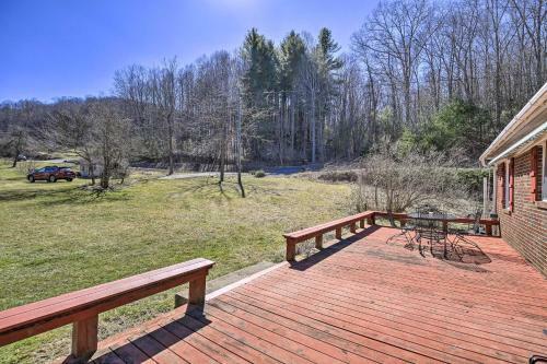 Quaint Creekside Home With Spacious Deck And Yard