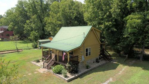 Yellow Cabin On The River Cabin