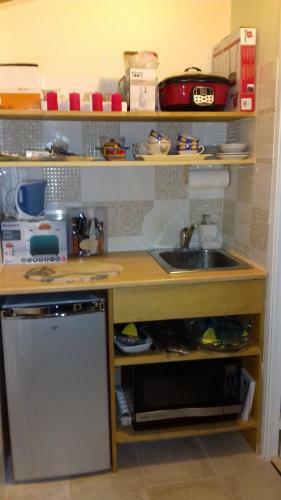 Emplacement Id�al Pour Cette Maisonnette Avec Jardin Et Cuisine D'�t�
