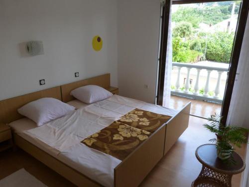 Apartments With A Parking Space Palit, Rab - 14996