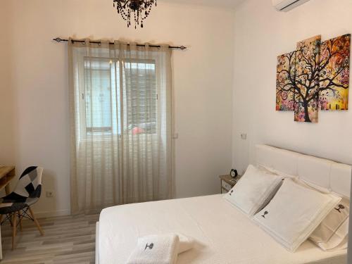 Casa Amendoeira Olh�o