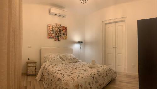 Casa Amendoeira Olh�o