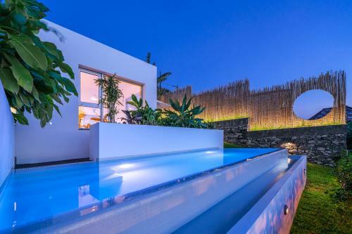 Casas Da Vargem Shared Swimming Pool By An Island Apart