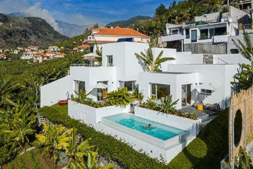 Casas Da Vargem Shared Swimming Pool By An Island Apart