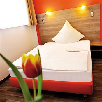 Orange Hotel Und Apartments