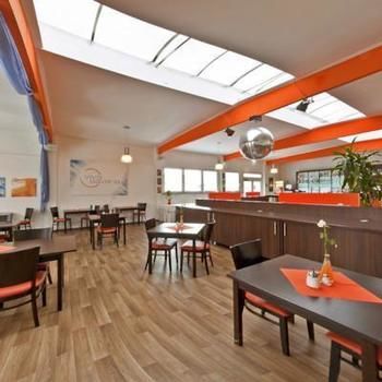 Orange Hotel Und Apartments