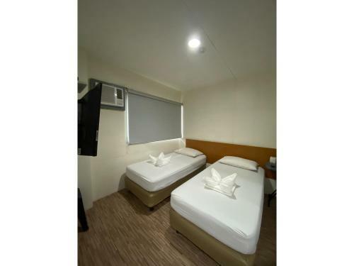 Hostal Oyo 878 Dg Budget Hotel Naia