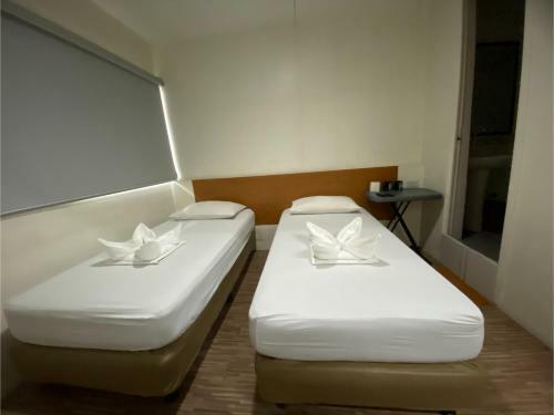 Hostal Oyo 878 Dg Budget Hotel Naia