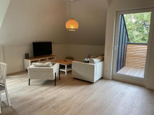 Apartamento Wohnen Am S�dstrand - Ferienwohnung 2 3