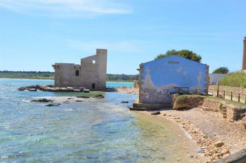 Blue House On The Sea