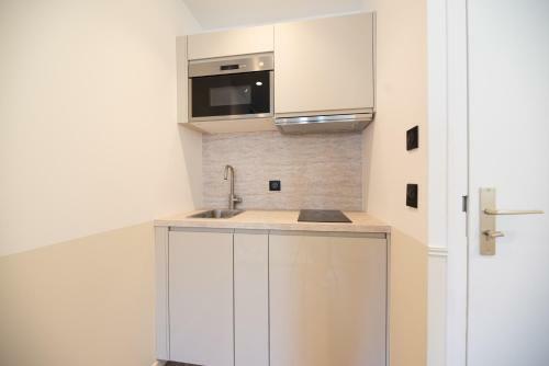 Apartamento Vignature Residence