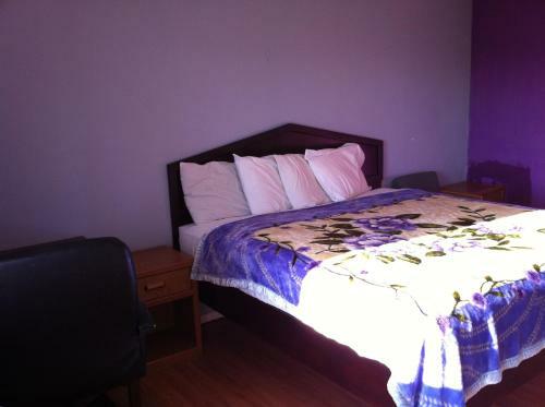 Motel Passport Inn & Suites