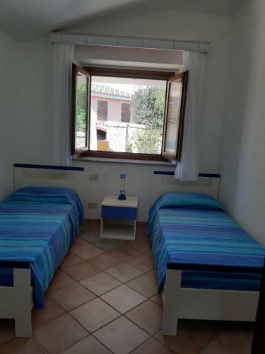 Viletta Bifamiliare Villaggio Baia Vignola