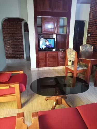 Hostal Puma Garden And Suites
