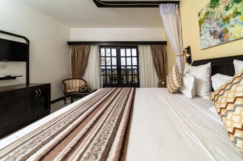 Hostal Room In Bb - Prideinn Flamingo Beach Resort Spa
