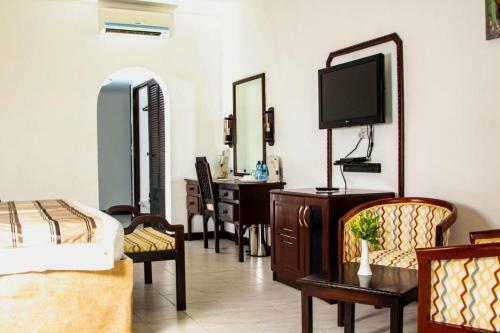 Hostal Room In Bb - Prideinn Flamingo Beach Resort Spa