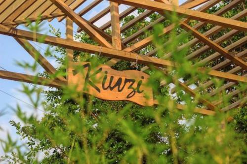 Kinzi Apartments,restaurant And Gardens